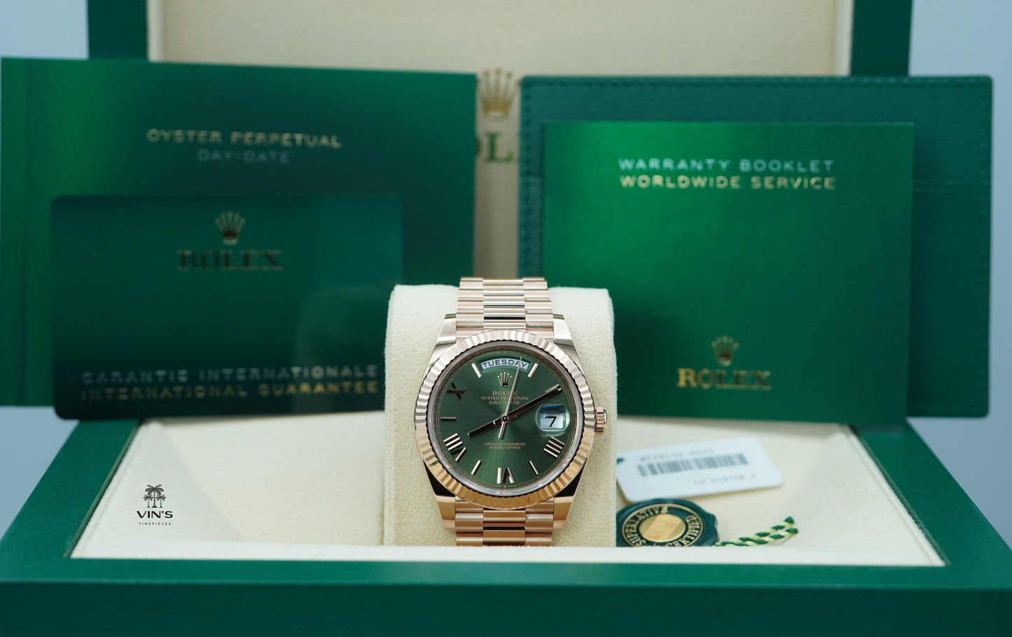 Rolex 228235 Day-Date 40 Vàng Hồng Mặt Số Xanh Olive Cọc Số La Mã 2024